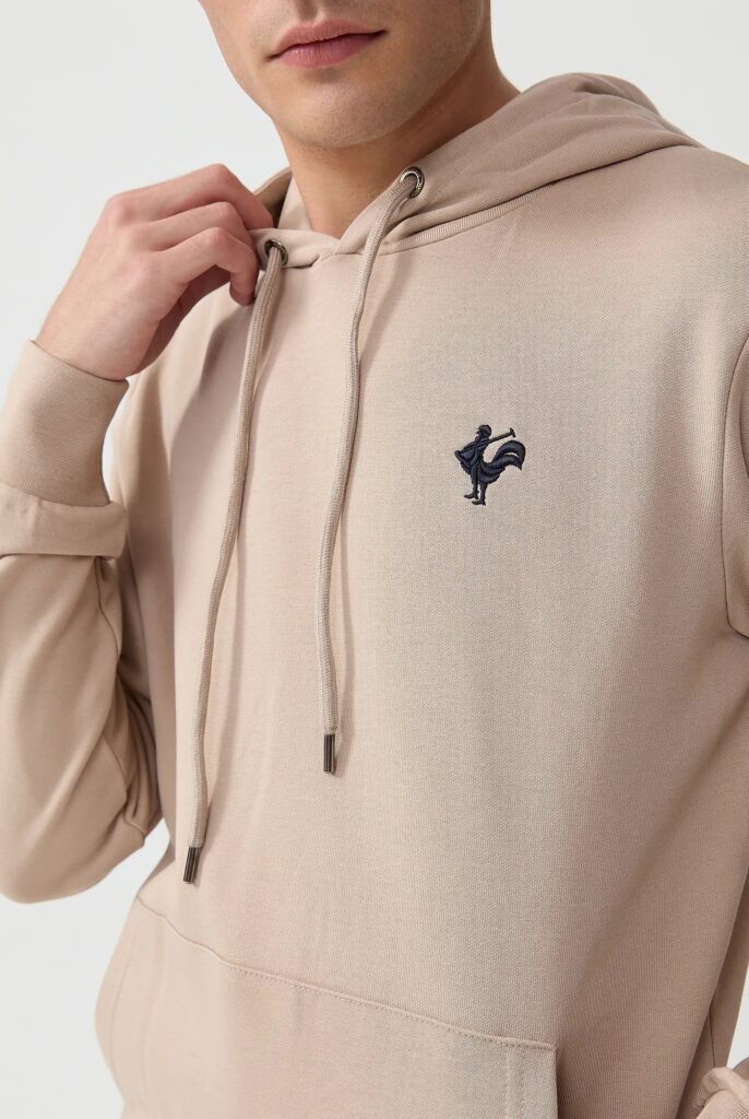 Visage:  Sweat à Capuche avec l’emblématique Logo du Coq Brodé - 14