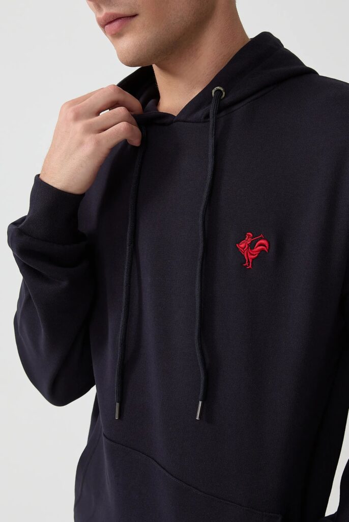 Visage:  Sweat à Capuche avec l’emblématique Logo du Coq Brodé - 19