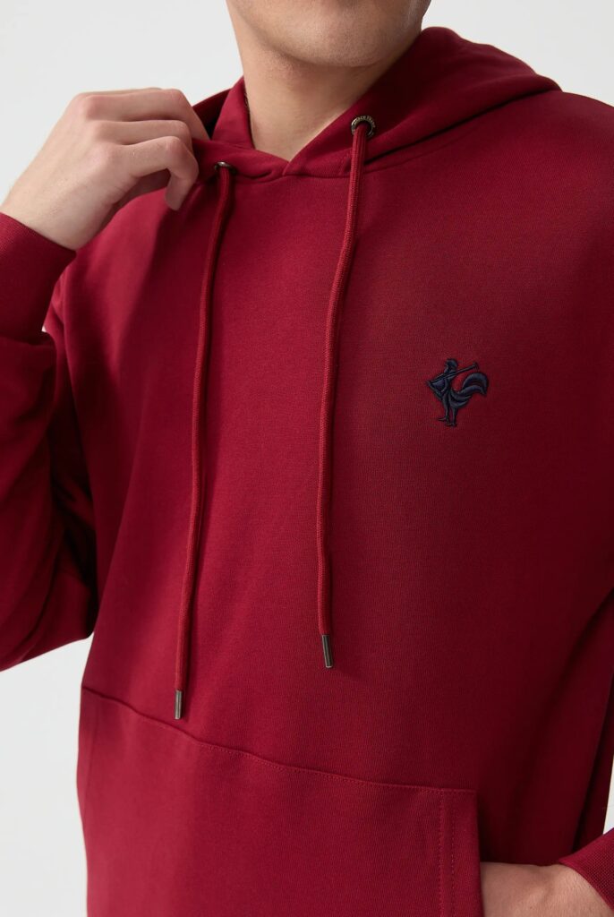 Visage:  Sweat à Capuche avec l’emblématique Logo du Coq Brodé - 29