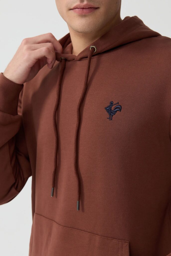 Visage:  Sweat à Capuche avec l’emblématique Logo du Coq Brodé - 39