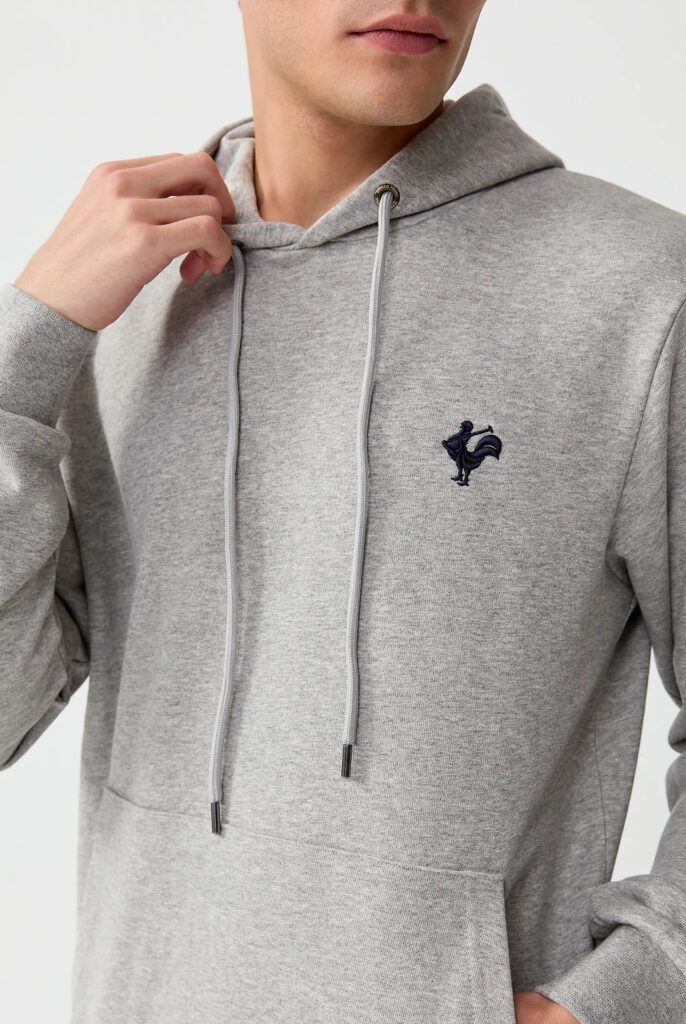 Visage:  Sweat à Capuche avec l’emblématique Logo du Coq Brodé - 44