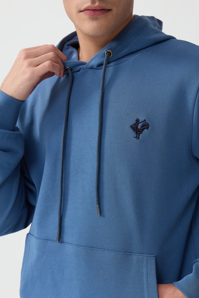 Visage:  Sweat à Capuche avec l’emblématique Logo du Coq Brodé - 49