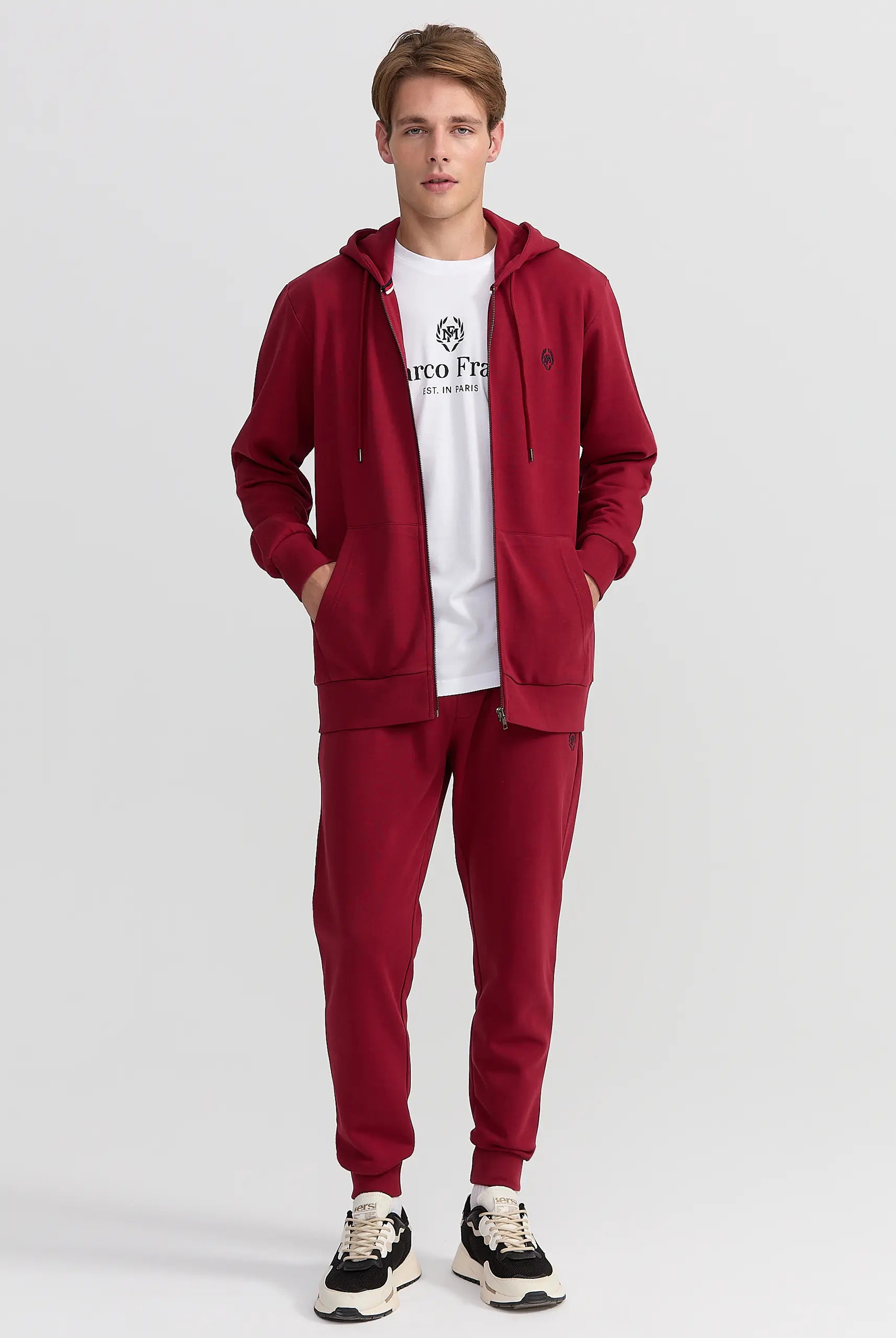 Wilson : Pantalon de survêtement Brodé du Logo Emblématique